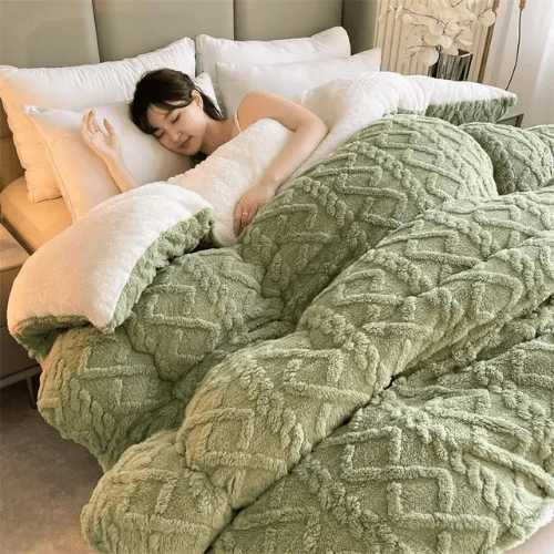 femme dormant avec la couette lestée dreamrest