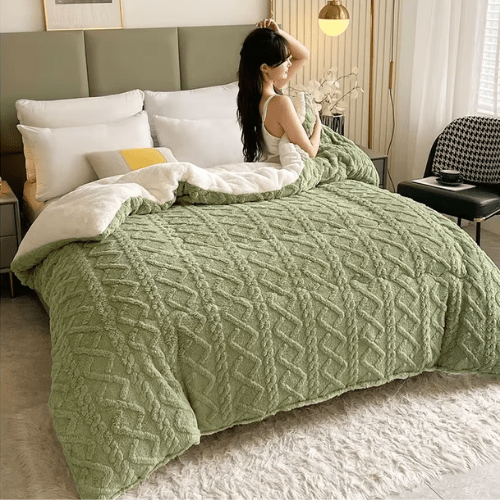 femme assise sur la couette lestée dreamrest
