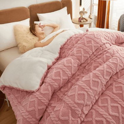 femme relaxant dans la couette lestée dreamrest rose