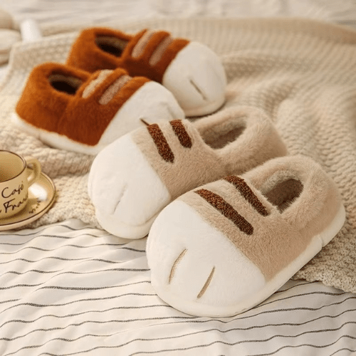 pantoufle femme confort catpaws sur un tapis