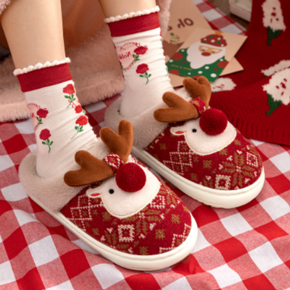 pantoufle noel reine au nez rouge porter par une femme