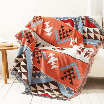 plaid nordique moderne orange placer sur un canapé blanc